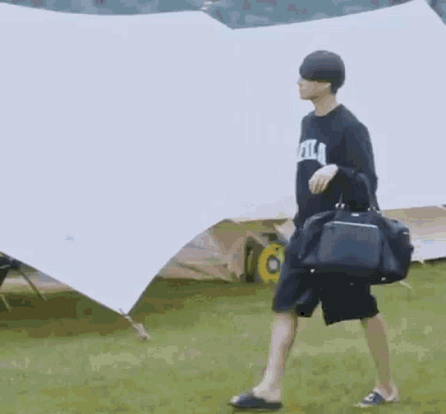 GIF: Jungkookie is coming with his luggage!