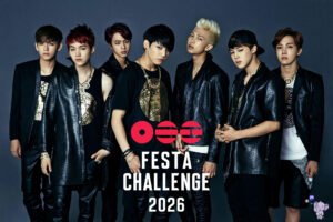 Seven male K-pop group members in black outfits posing for a promo poster; text reads 'FESTA CHALLENGE 2026'.